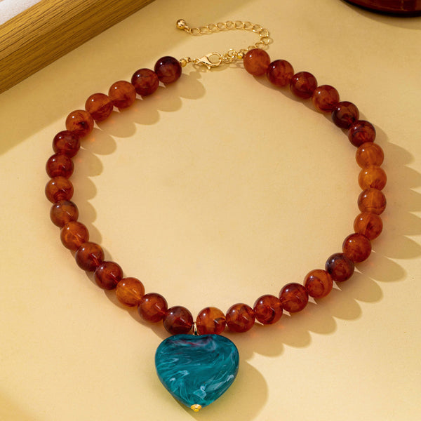 JOSSLYN by wall to wall - Marbled Bead Heart Pendant Statement Necklace | 80N93830