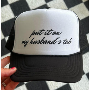 Put It On My Husband's Tab Trucker Hat - Black and White